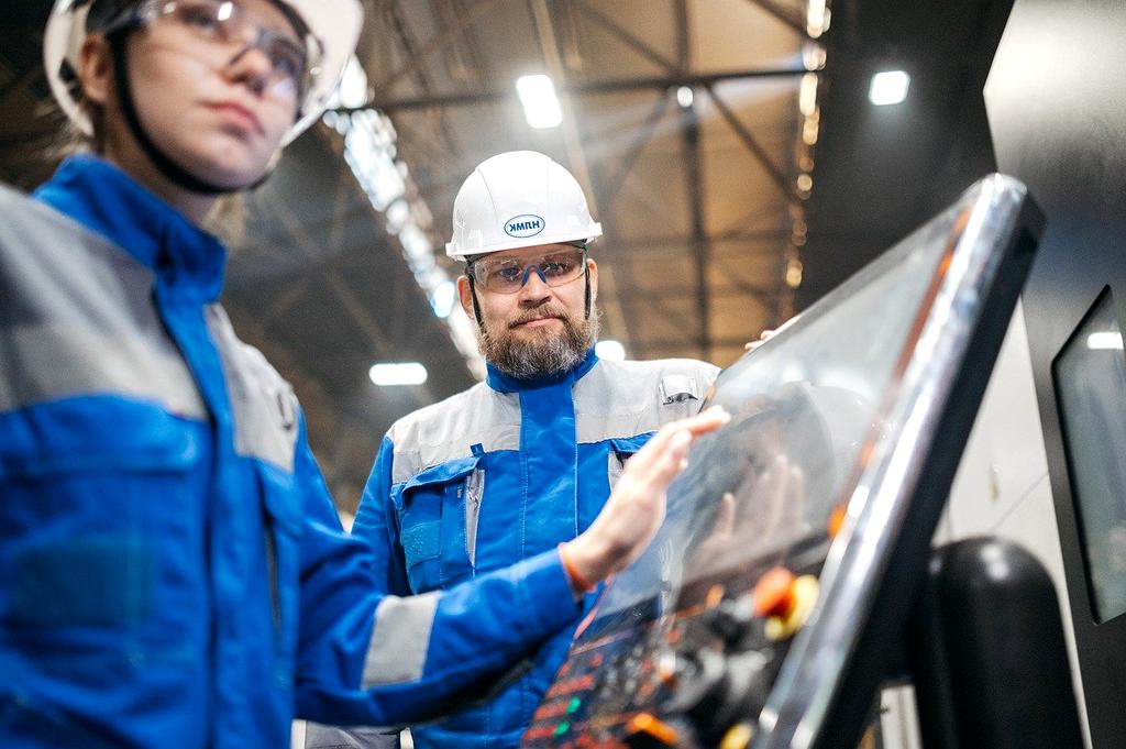 Engineer analyzing SCADA control panel for course overview